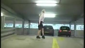 Young woman urinates in the subterranean garage