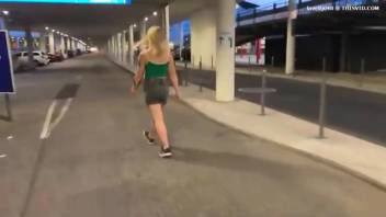 Female defecates in parking lot