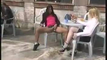 Urinating at a cafe table