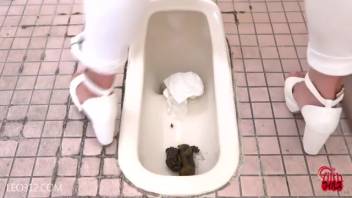Asian lady with a massive poop
