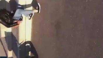Motorcycle chick defecates on the street