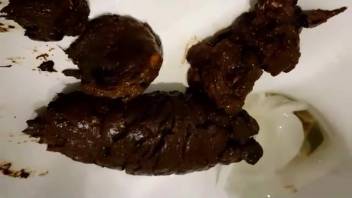 Massive poop emerging from an adorable woman's rear