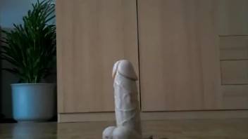 Chick bounces on dildo while pooping