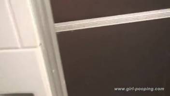Young woman pooping on the potty